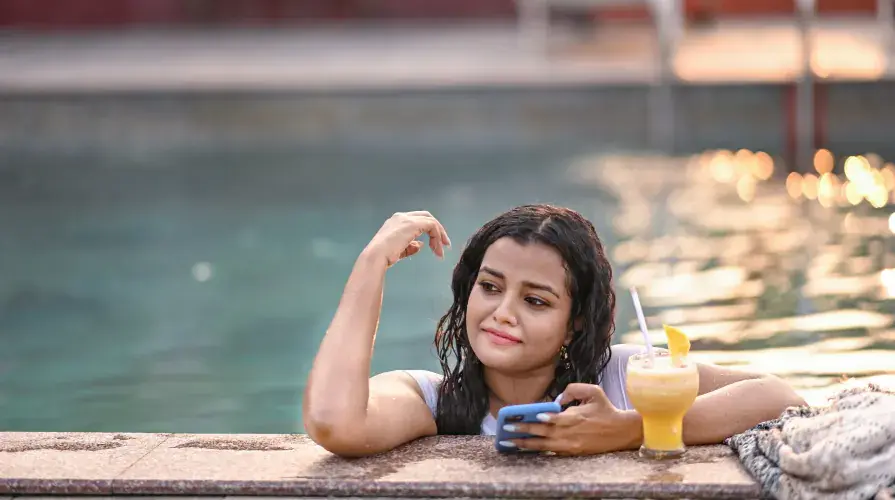 Guest relaxing at the swimming pool