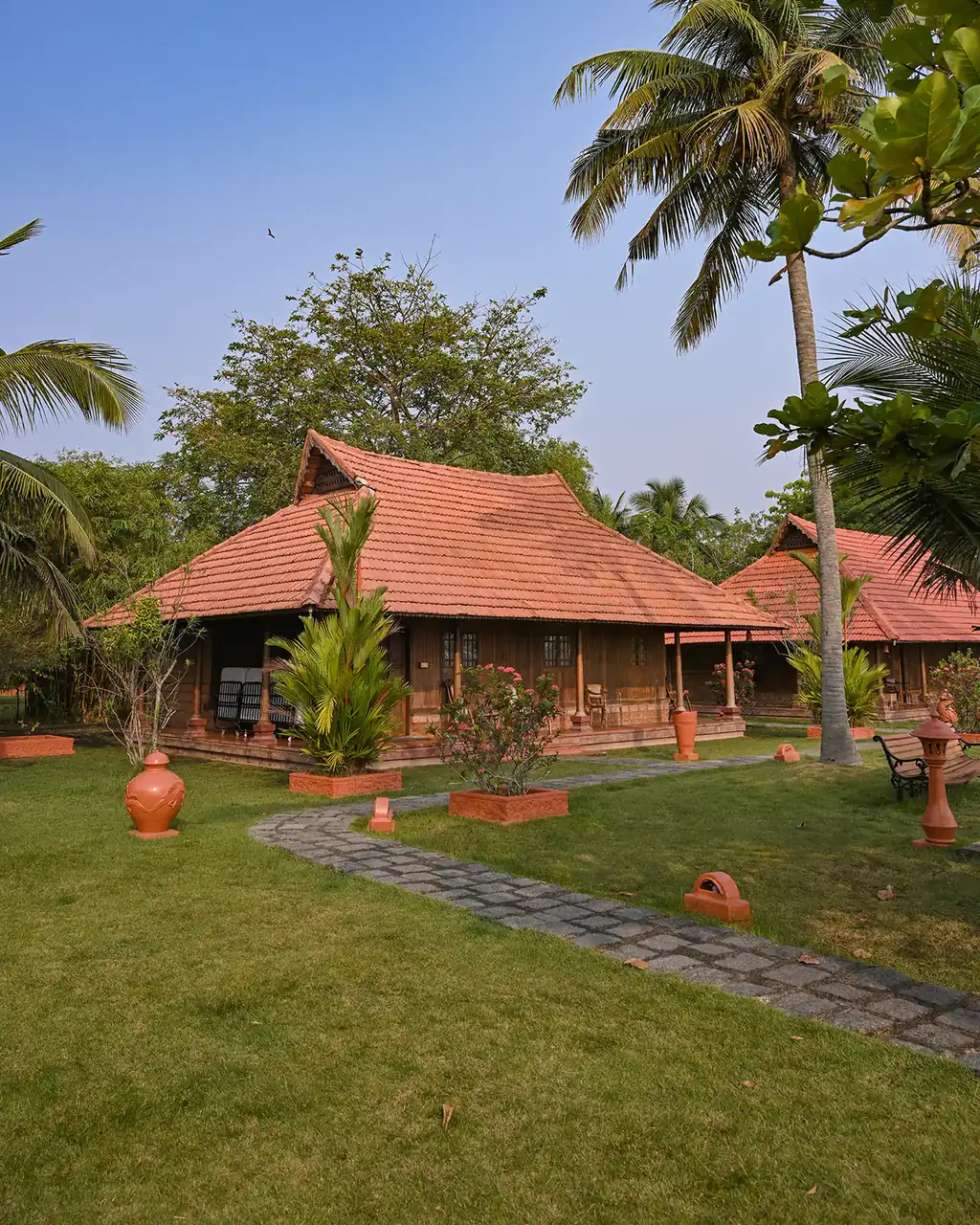 Tiled-roof Super Deluxe Cottages set in the lawn