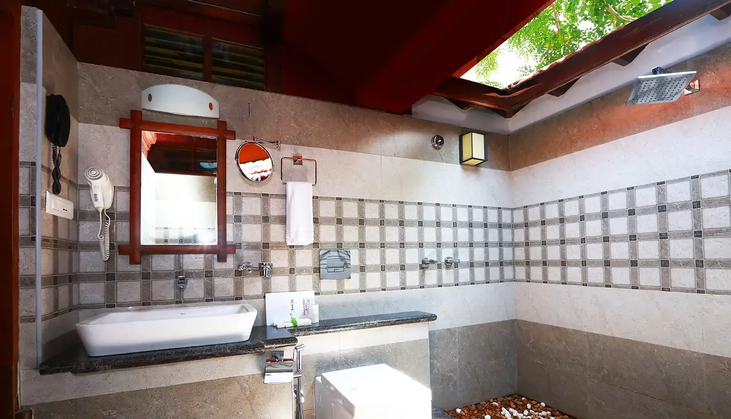 Super Deluxe Cottage bathroom with skylight