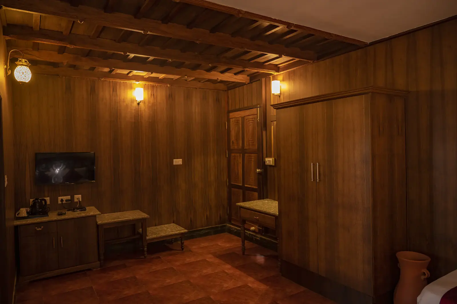 Wooden wardrobe and TV unit in the Super Deluxe Room